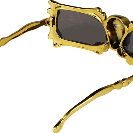 Goldene Brille Skelett