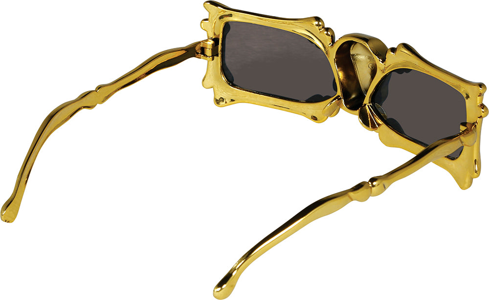 Goldene Brille Skelett