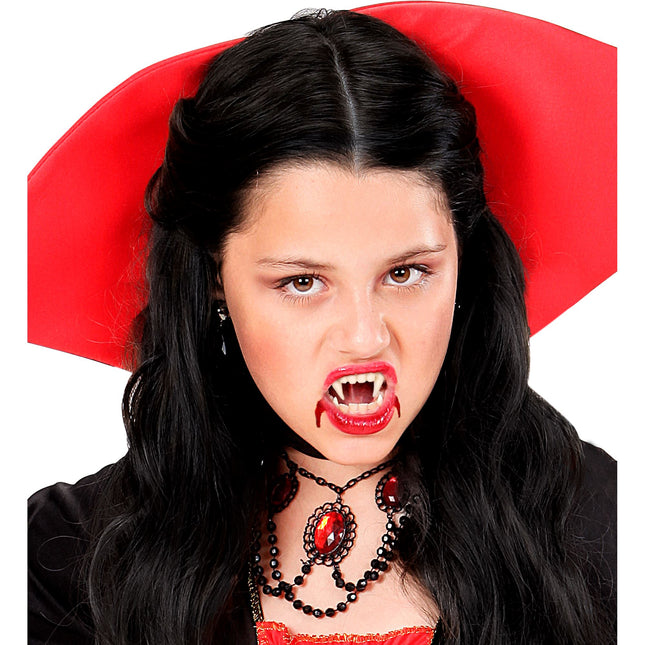 Gefälschte Vampirzähne Kind