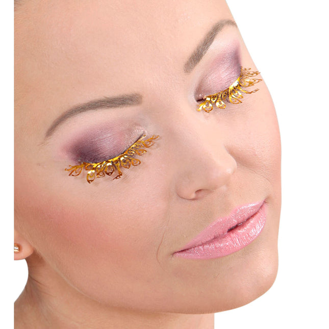 Goldene falsche Wimpern