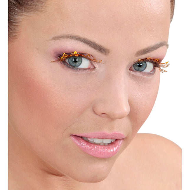 Goldene falsche Wimpern