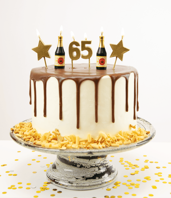 Kaarsjes 65 Jaar Champagne 17,5cm van Paper Dreams koop je bij Partywinkel
